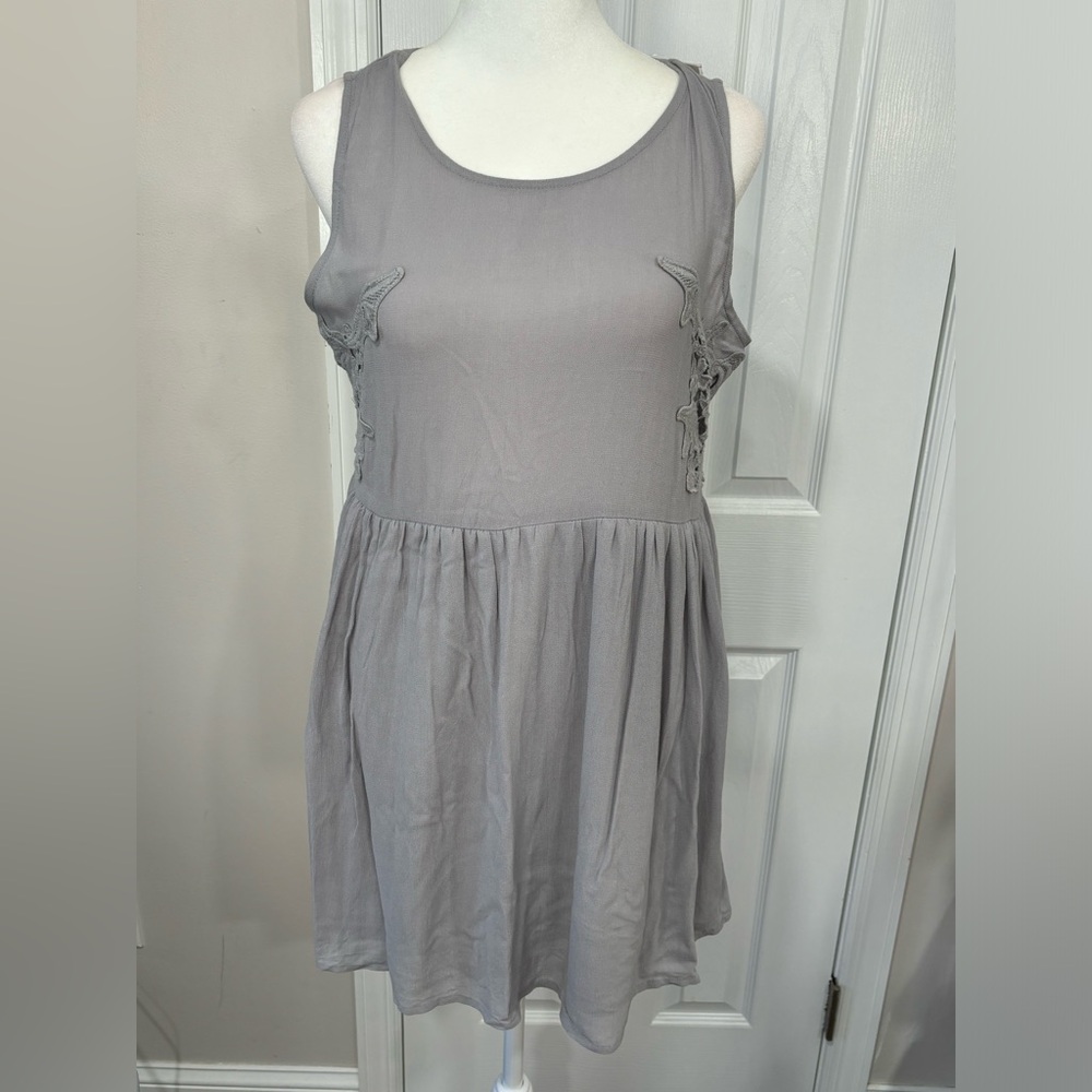 Chloe K light gray mini dress with crochet side detail size M